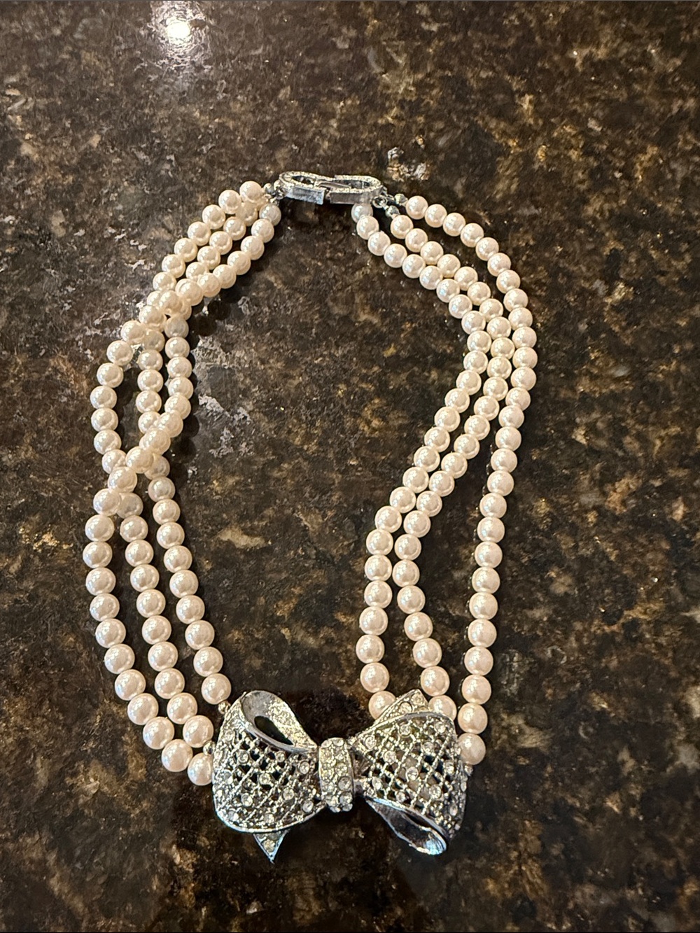 Elegant Pearl Multi-Strand Necklace with Bow Accent